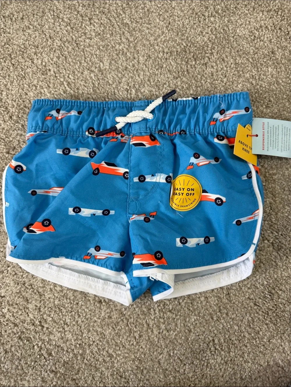 NWT infant boys Blue race car Swim Shorts with lining size 12 month